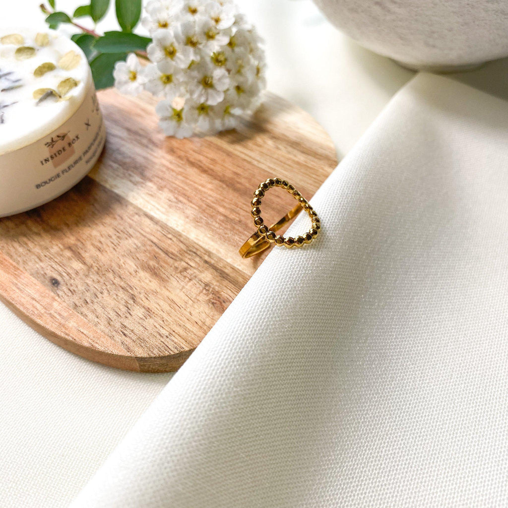 Bague rond ajouré composée de petites boules en acier inoxydable doré - modèle ajustable-Lany-bijoux