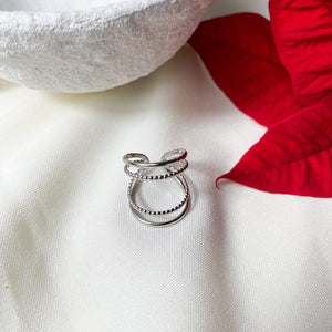 Bague quatre anneaux fins en acier inoxydable argenté - modèle ajustable.-Lany-bijoux
