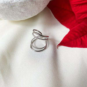 Bague quatre anneaux fins en acier inoxydable argenté - modèle ajustable.-Lany-bijoux