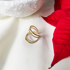 Bague quatre anneaux fins en acier inoxydable doré - modèle ajustable.-Lany-bijoux